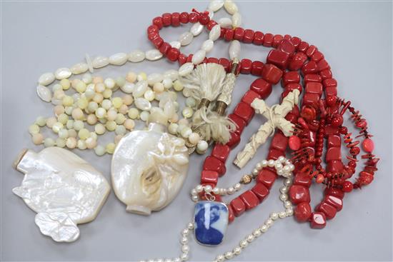 A carved ivory cross and other items including a Mother of Pearl snuff bottles etc.